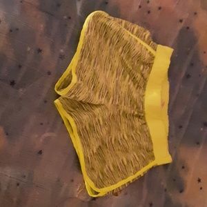 Justice shorts yellow and gray.
